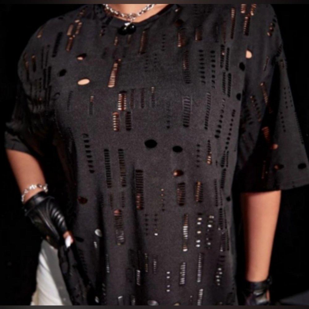 COPY - Fun black shirt with holes. Add a colorful tank underneath for a super c…